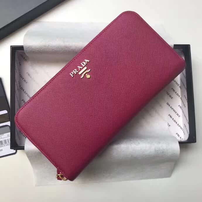 【原版皮】普拉达/Prada 拉链钱夹，选用十字纹小牛皮裁制而成，正面点缀金色散字徽标，尽显高档时尚，低调而又奢华，款号：1ML506